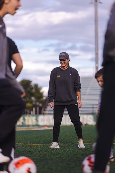 Coach instructing players